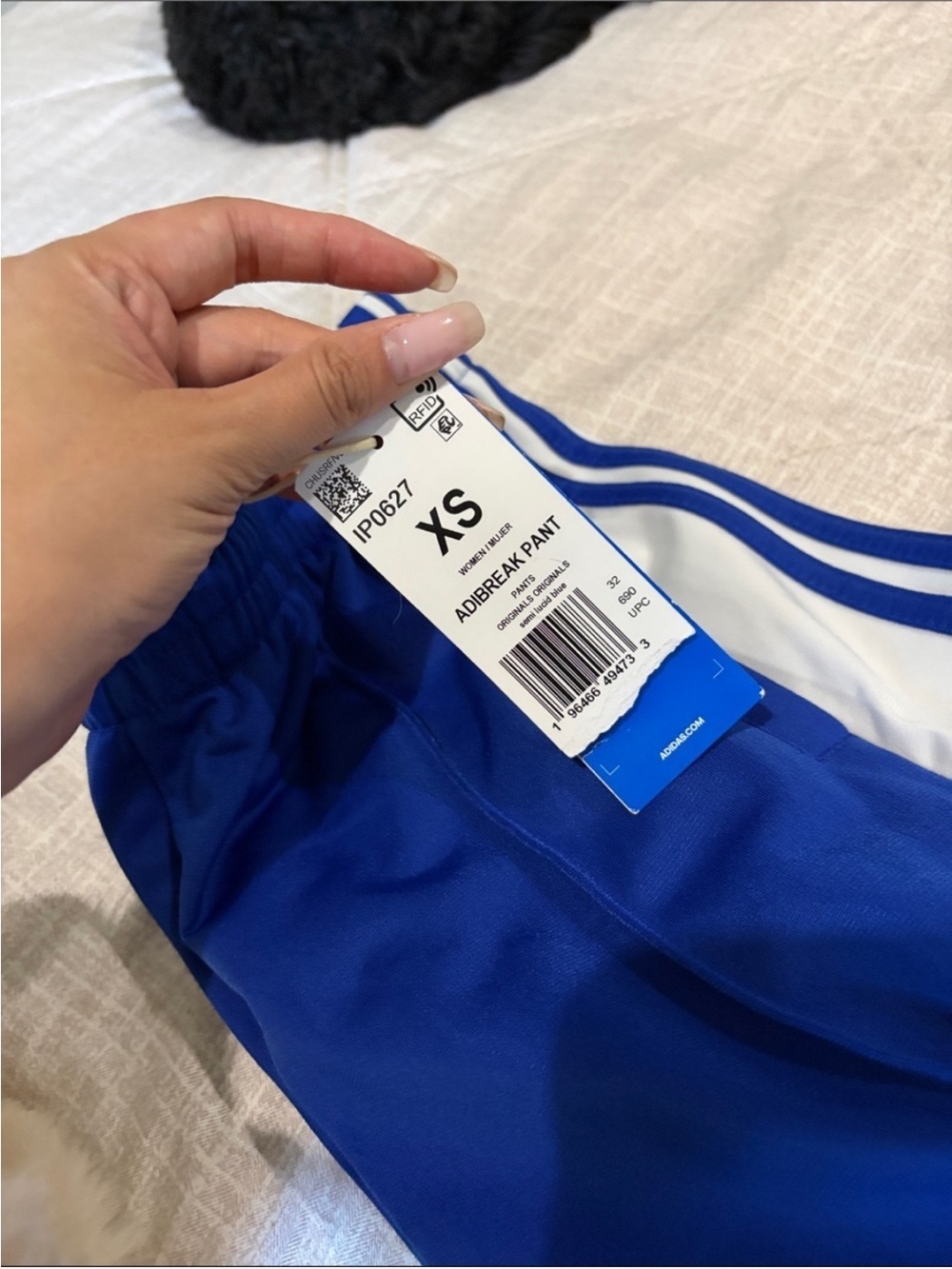 Adidas Blue Track Pants with Classic White Stripes - Picture 9 of 10